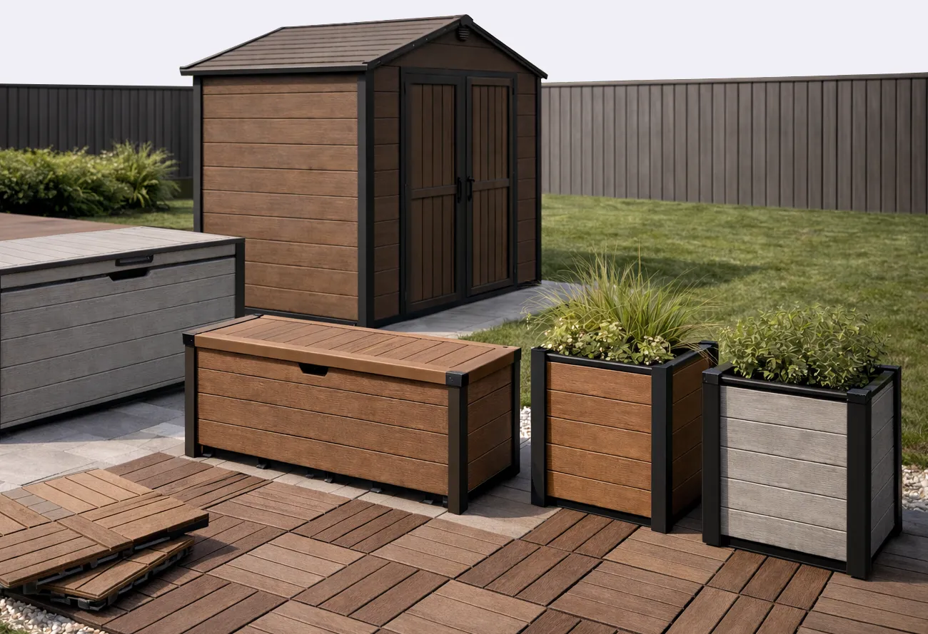 Assorted WPC outdoor products including deck tiles, storage boxes, planter boxes with black aluminium corners, and a composite shed in a backyard setting.