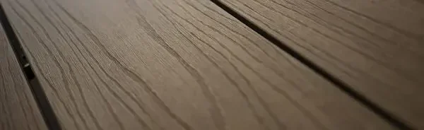 close up brown wood grain composite decking